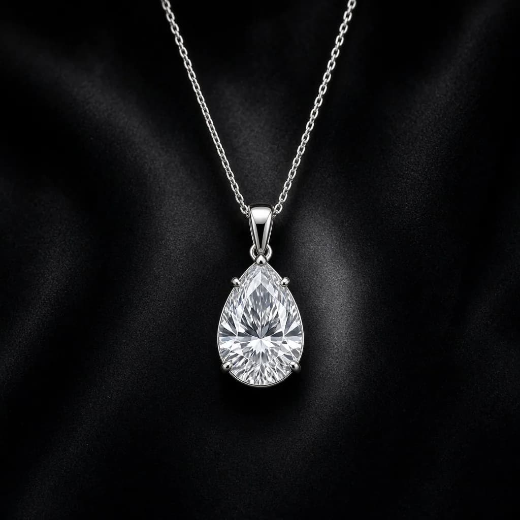 Pear-cut moissanite pendant on a fine stainless steel cable chain